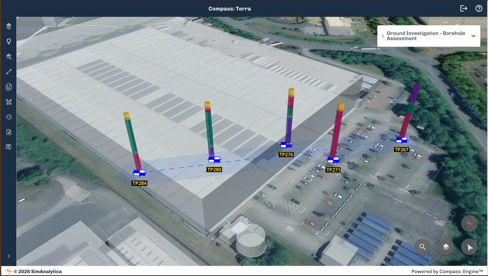 Compass: Terra 3D site model with borehole columns plotted directly on aerial site imagery, combining the spatial view and ground data in one workspace